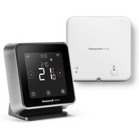 Schwarzer T6R Wireless-Smart-Thermostat auf dem Tisch von RESIDEO