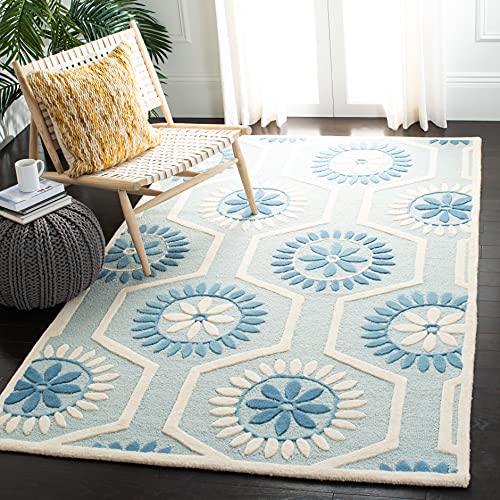 SAFAVIEH Zeitgenössische Teppich für Wohnzimmer, Esszimmer, Schlafzimmer - Cambridge Collection, Kurzer Flor, Blau und Elfenbein, 91 X 152 cm von Safavieh