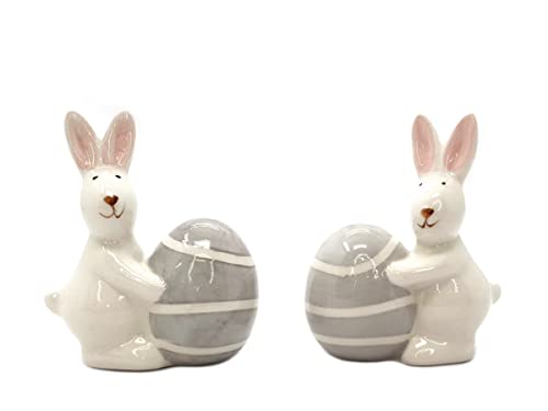 meindekoartikel 2er-Set Hasen mit Osterei aus Keramik Dekofigur Ostern Frühling Osterhasen Sortiert (Weiß) B6xH8xT3cm von meindekoartikel