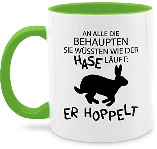 Tasse Tassen 325ml - Ostergeschenke - Der Hase hoppelt - 325 ml - Hellgrün - frohe ostern oster kleinigkeit ostermotive easter osterhasen mit ostermotiv ostersachen ostergeschenk osterartikel hasen von Shirtracer