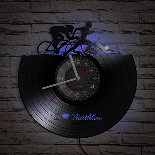Smotly Vinyl Wanduhr Triathlon Form mit LED Nachtlicht, eine Wanduhr Geschenk für Sportliebhaber in Schwarz, 30 cm x 30 cm Smotly Vinyl Wanduhr Triathlon Form mit LED Nachtlicht, eine Wanduhr Geschenk für Sportliebhaber in Schwarz, 30 cm x 30 cm von Smotly