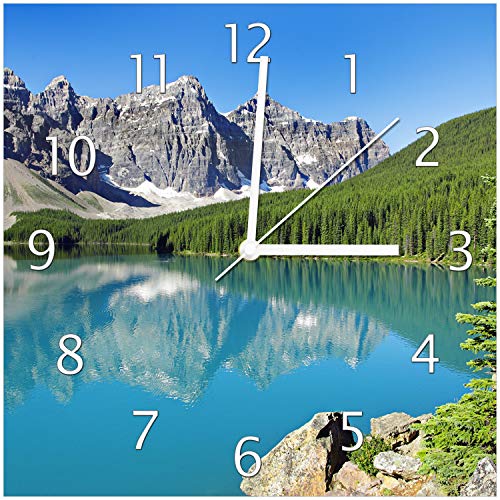 Wallario Design-Wanduhr Tiefblauer See mit Bergpanorama und Wäldern Kanada aus Glas, Motiv-Uhr Größe 30 x 30 cm, weiße Zeiger Wallario Design-Wanduhr Tiefblauer See mit Bergpanorama und Wäldern Kanada aus Glas, Motiv-Uhr Größe 30 x 30 cm, weiße Zeiger von Wallario