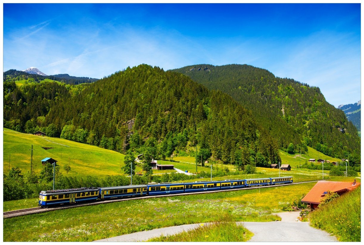 Wallario Vliestapete Eisenbahn in einer Sommerlandschaft in der Schweiz, seidenmatte Oberfläche von Wallario