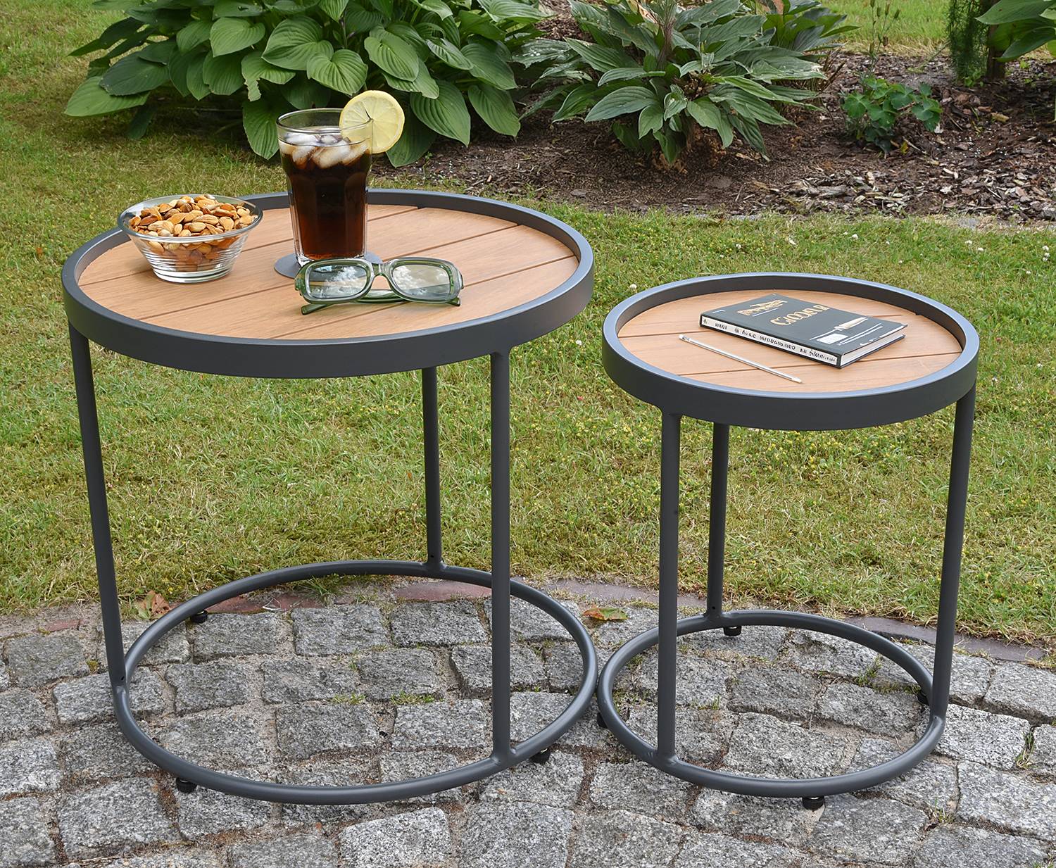 home24 Beistelltisch 2er-Set Aluminium, pulverbeschichtet Polyester PVC Teakholz Massiv, geölt 50 x 45 x 50cm Schwarz/Braun home24 Beistelltisch 2er-Set Aluminium, pulverbeschichtet Polyester PVC Teakholz Massiv, geölt 50 x 45 x 50cm Schwarz/Braun von home24